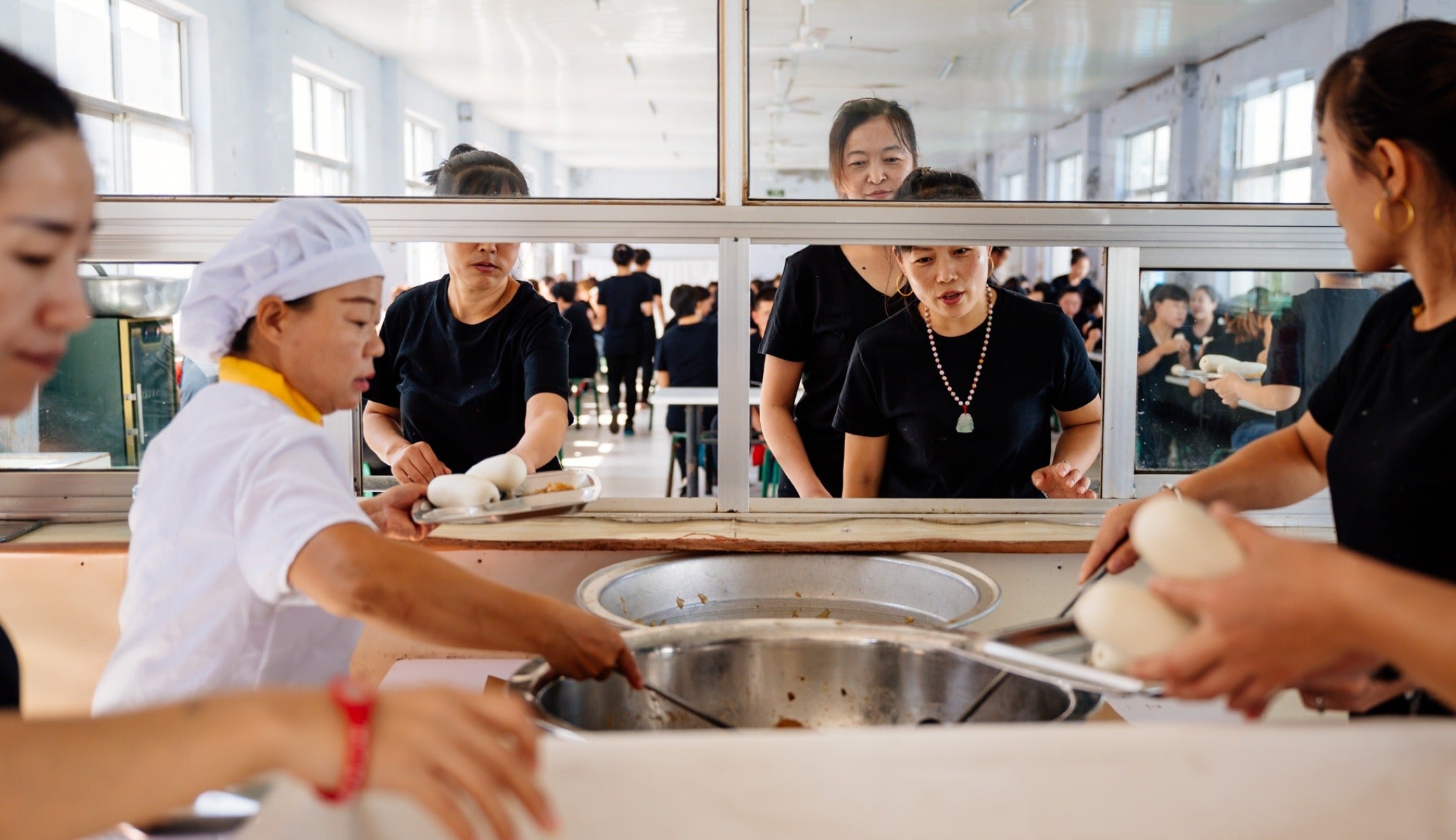 Free lunches supplemented with food from the factory’s onsite garden are just one of many benefits for employees working here